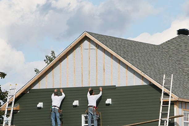 Professional Siding Repair technician working in Victoria, MN
